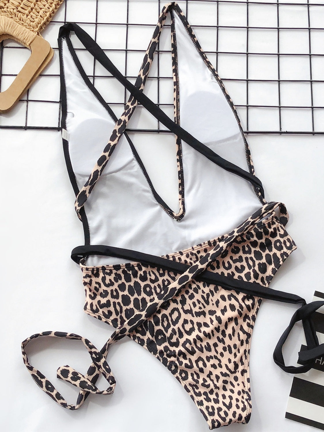 Unleash Your Wild Side: The Animal Print One-Piece That Roars Confidence