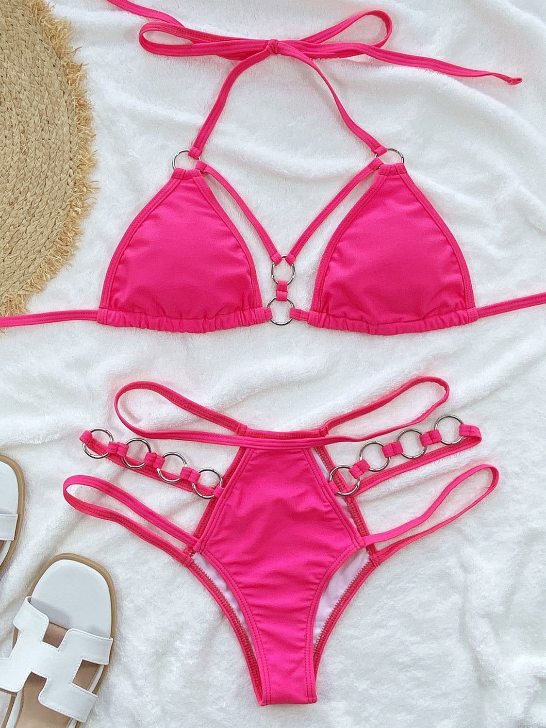 All Eyes on You: The Cutout Halter Bikini with Thigh Straps That Sizzles