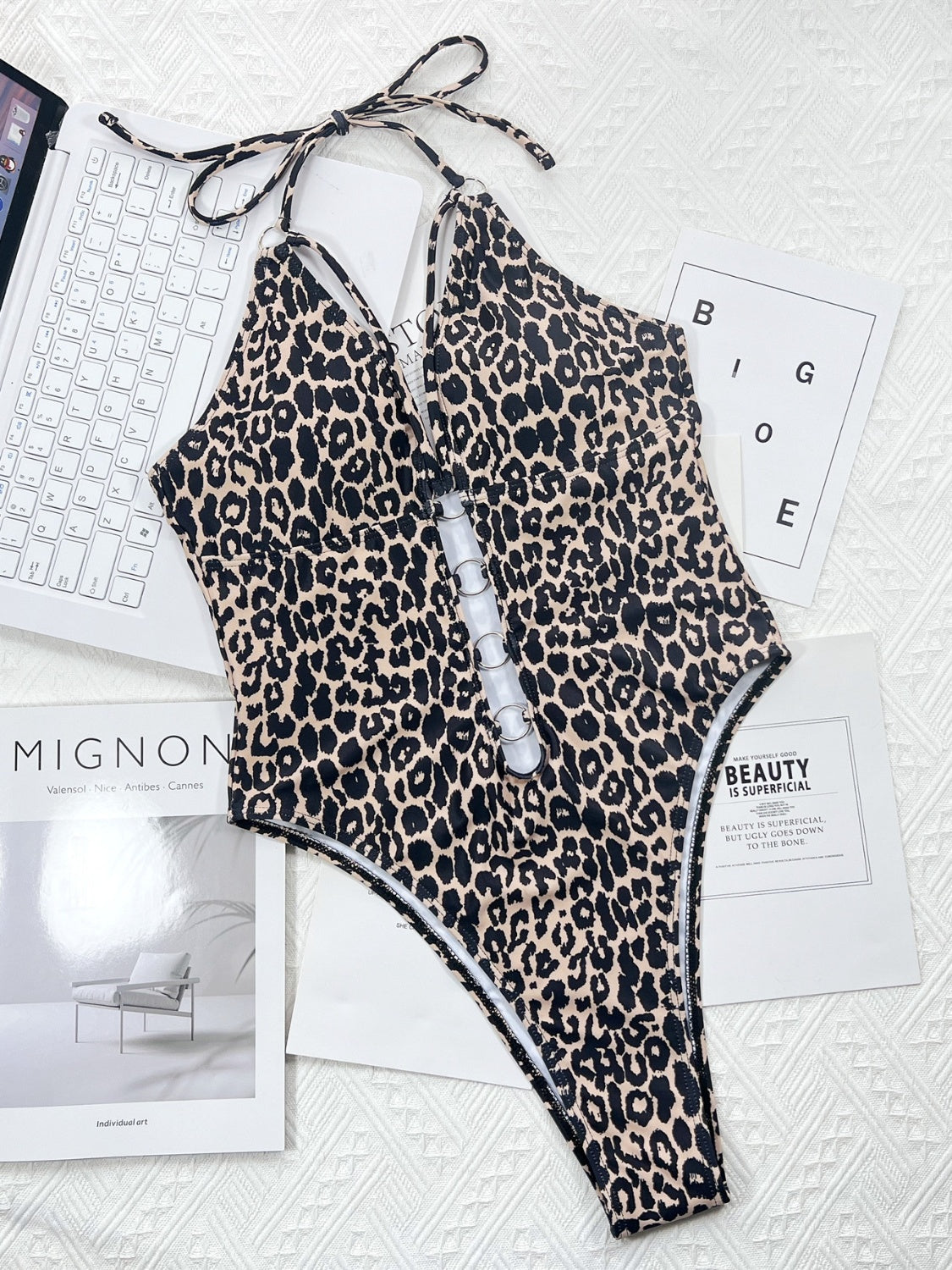 Untamed & Irresistible: The Leopard Cutout One-Piece That Roars Confidence
