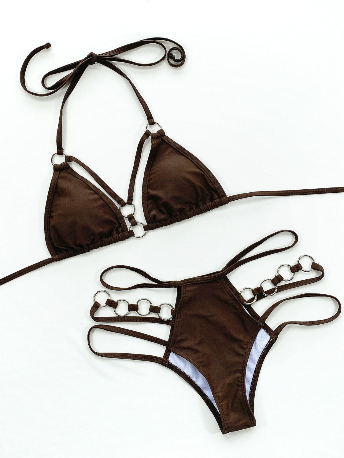 All Eyes on You: The Cutout Halter Bikini with Thigh Straps That Sizzles