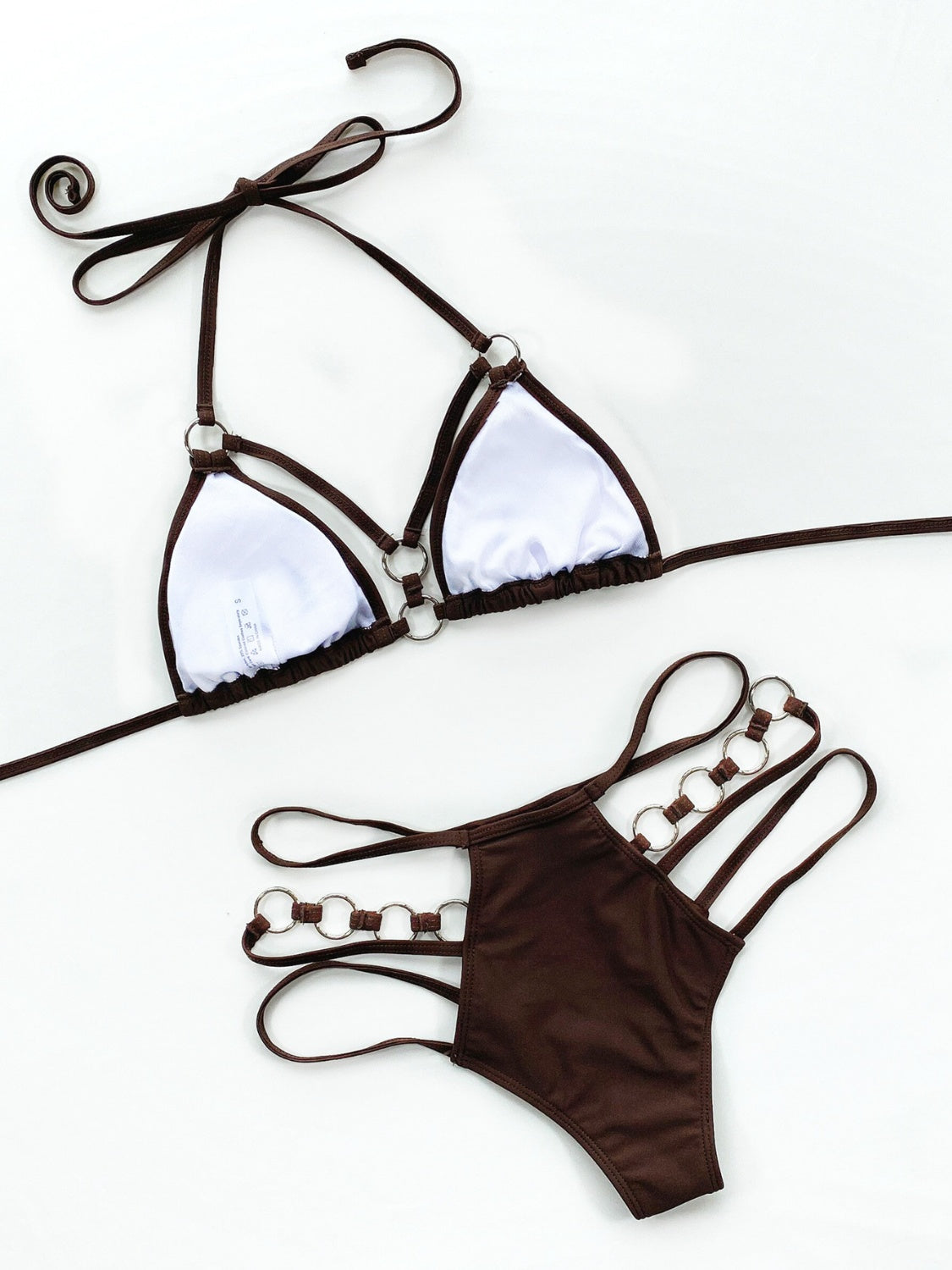 All Eyes on You: The Cutout Halter Bikini with Thigh Straps That Sizzles